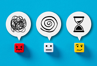 Three dice with stressed, neutral and thoughtful faces and a thought bubble above each