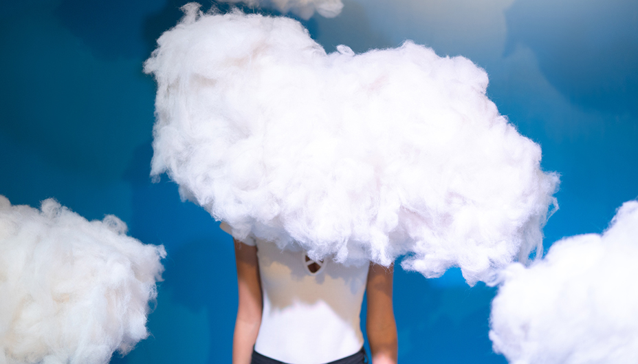 A person obscured by a cloud.