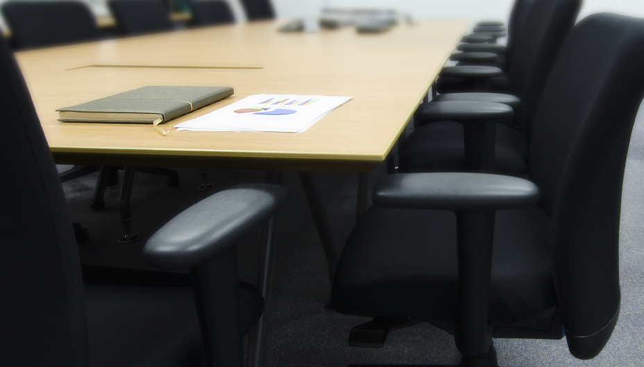 A photo of a conference room table.