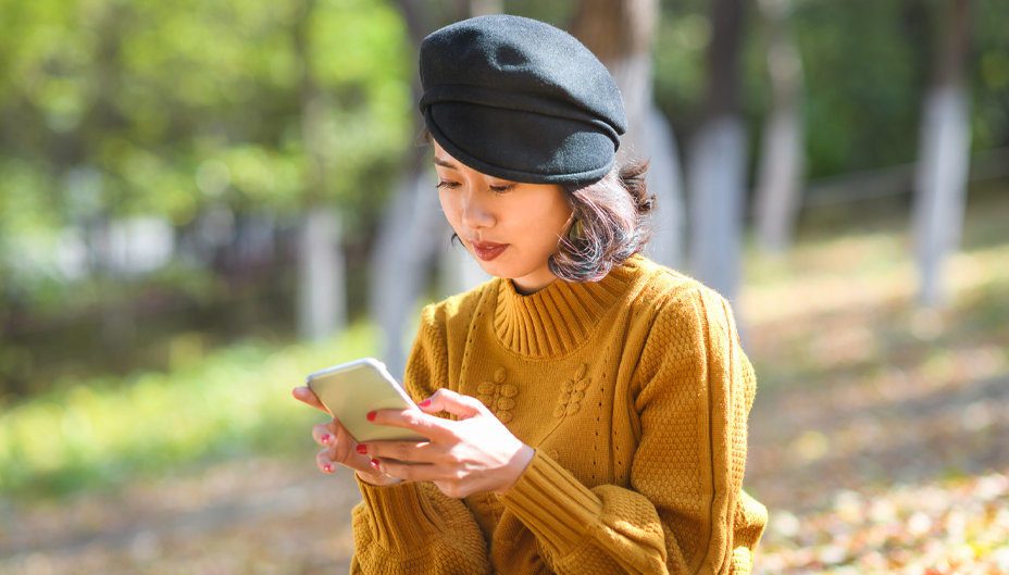 A woman checking her phone.