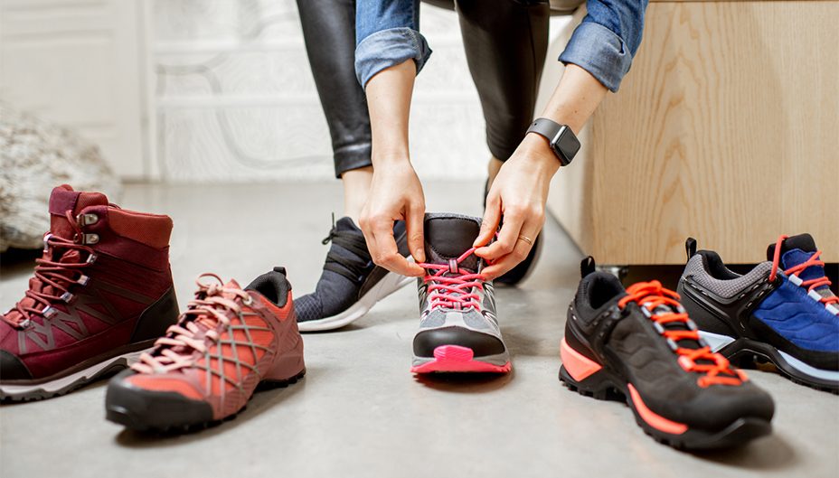 A person tries on different shoes in an analogy for picking between a TFSA and a RRSP.