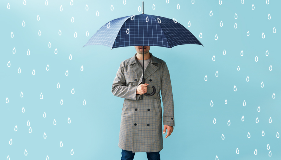 Un homme se protège avec un parapluie contre des gouttes de pluie stylisées.