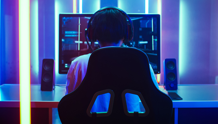 Back view of person competing in an e-sport.